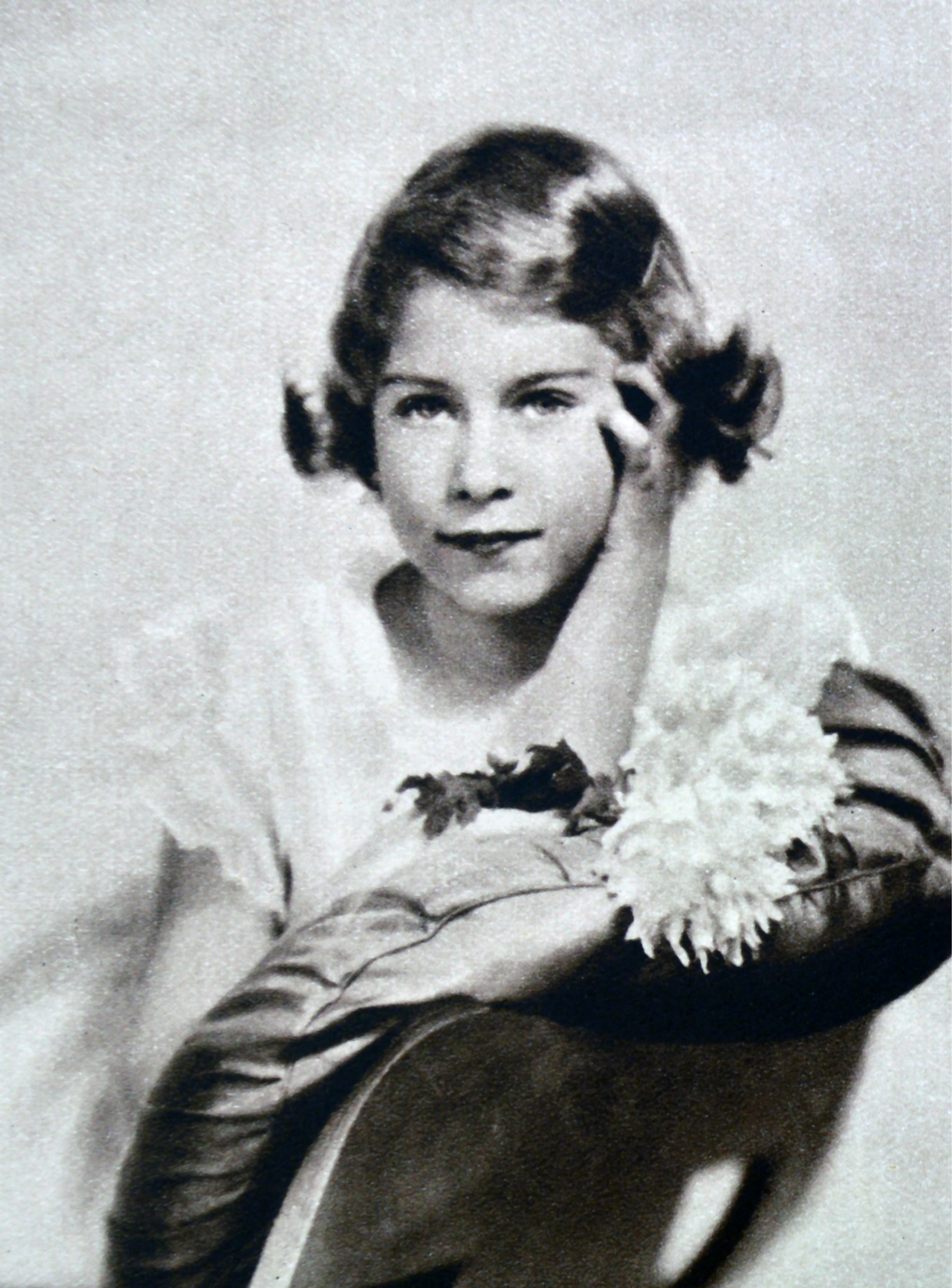 Princess Elizabeth of England poses for a 1935 portrait at the age of 9.