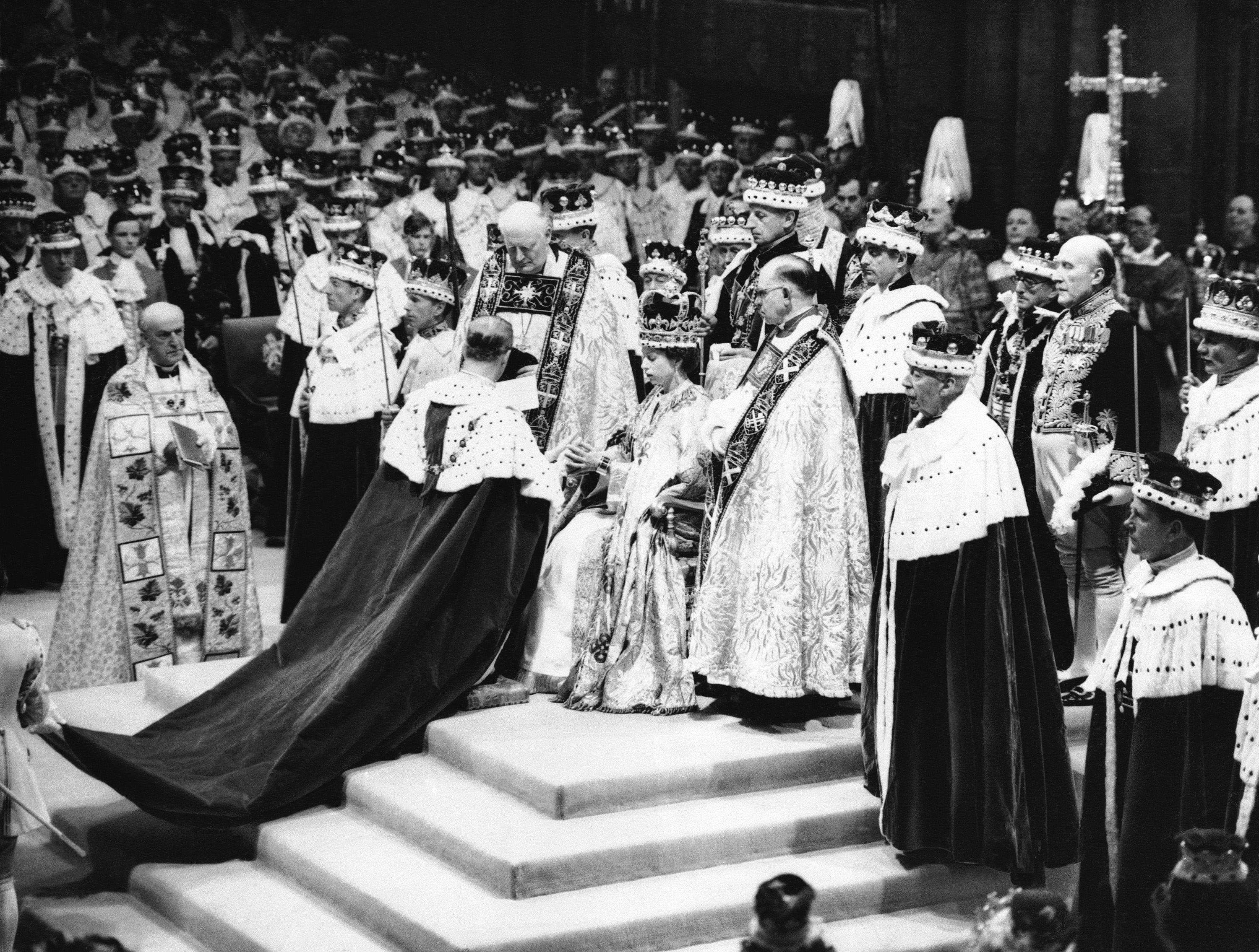 Elizabeth sits in the Chair of Estate in Westminster Abbey, London, June 2, 1953, before <a rel="noreferrer noopener" href="https://www.royal.uk/50-facts-about-queens-coronation-0#:~:text=The%20Queen%20succeeded%20to%20the,years%20to%20accede%20while%20abroad." target="_blank">she was crowned during her coronation</a>.