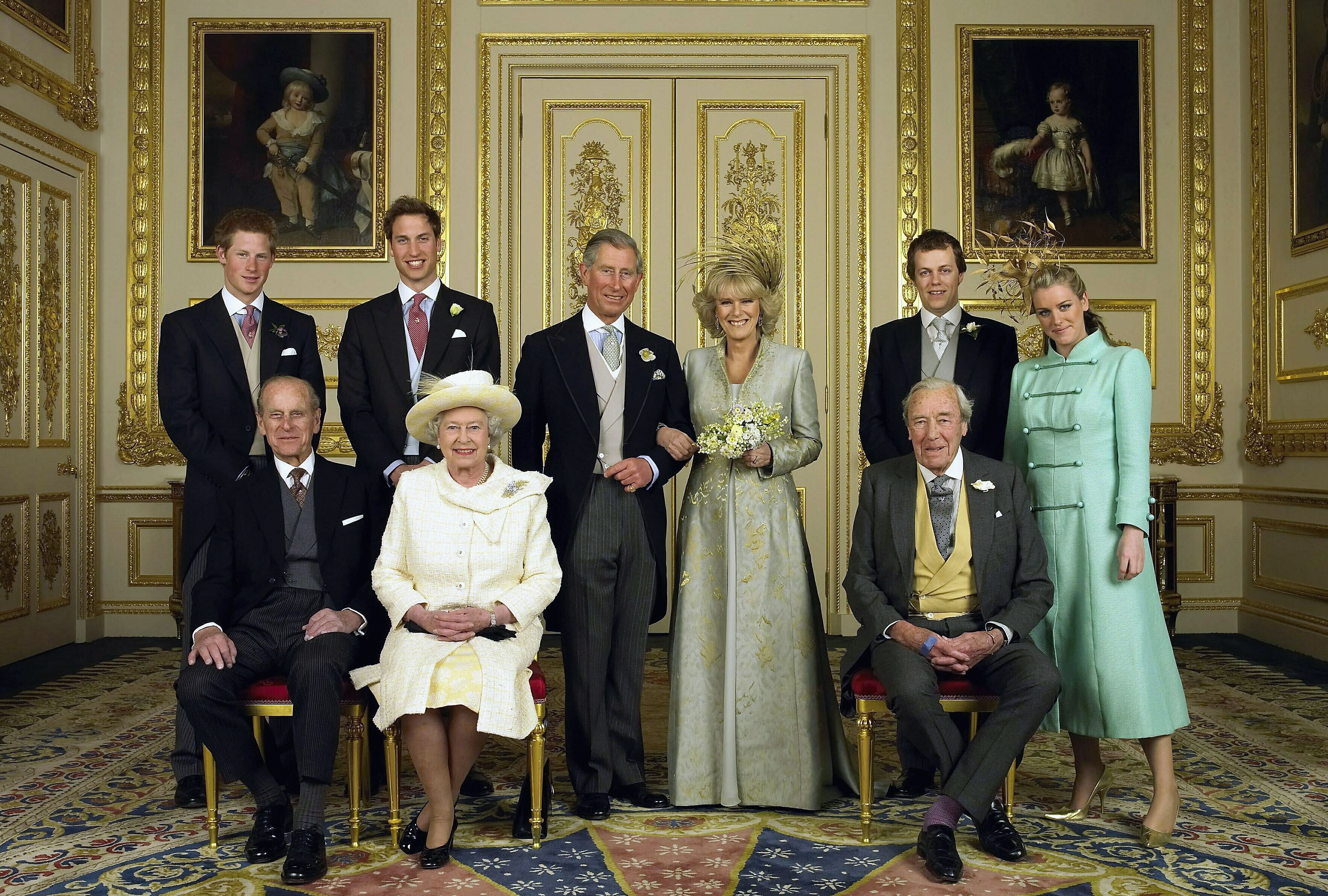 Prince Charles, the Prince of Wales and Camilla Parker-Bowles, Duchess of Cornwall, pose for a wedding photo with their children and parents in the White Drawing Room at Windsor Castle following their marriage, April 9, 2005, in Windsor, England. From left: Prince Harry, Prince William, Laura and Tom Parker-Bowles are seen at the back, with Queen Elizabeth II, Prince Philip and Bruce Shand at the front.