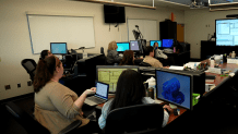 It generally takes 14 to 16 months for dispatcher trainees like these to complete instruction in order to answer 911 calls.