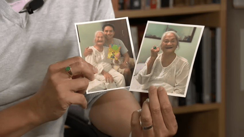La Mesa-based author Minh Lê holds up photos of him and his grandmother.
